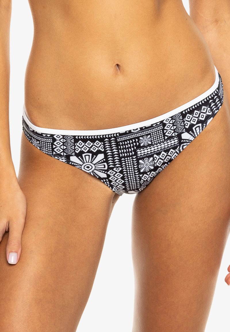 Black and white bikini bottom with geometric patterns, featuring a low-rise cut and a white waistband. Smooth fabric texture.