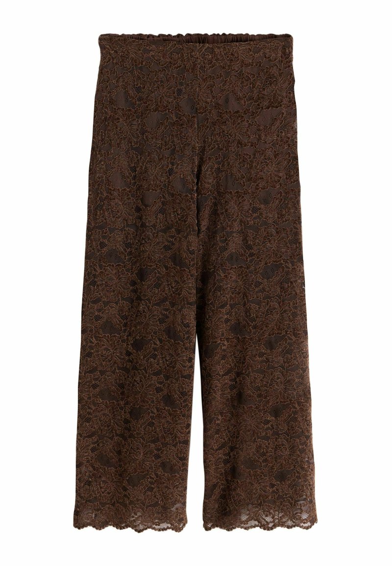 Pantalon large en dentelle marron avec ceinture élastique et motif floral, longueur raccourcie et ourlet festonné.