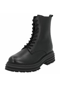 Bota de cuero negro hasta el tobillo con un acabado suave, punta redonda, diseño de cordones, cuello acolchado y suela de goma gruesa y texturizada.