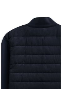 Back view of black padded jacket with horizontal quilting and a ribbed collar on a white background.