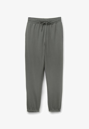 Olivové teplákové kalhoty s elastickým pasem a šňůrkou, zužující se nohavice a elastické manžety, zobrazené v plochém uspořádání na bílém pozadí.