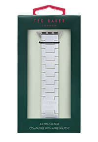 Bracciale per Apple Watch in silicone bianco con design a maglie. Imballato in una scatola verde con accenti rossi, compatibilità indicata per 42 mm/44 mm.