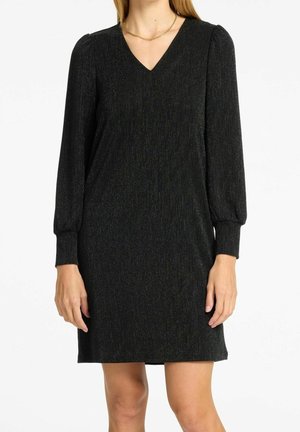 Sort V-halskjole med lange puffærmer, lavet af et struktureret, skinnende materiale med subtile iriserende tråde.