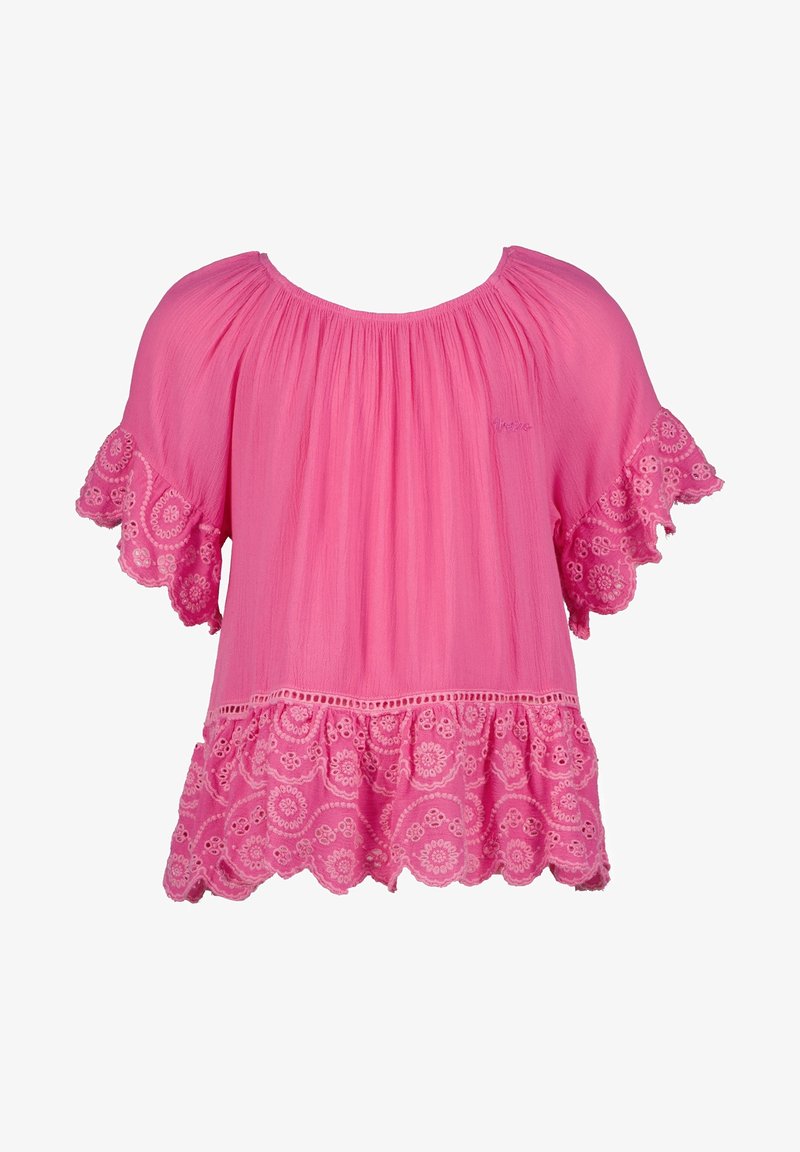 Blouse rose ample avec larges manches en dentelle festonnée et ourlet orné de broderies florales, col froncé.