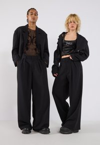 YOURTURN UNISEX - Tygbyxor - black