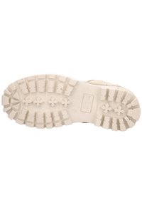 Semelle en caoutchouc blanche avec un motif de semelle épaisse et robuste, et des bosses surélevées pour une meilleure adhérence. Logo de la marque et indication de la taille présents sur la surface.