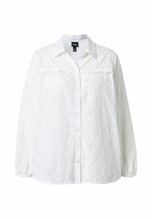 Biała koszula z długim rękawem zapinana na guziki, z kwiatowym koronkowym wzorem, kołnierzykiem i elastycznymi mankietami.