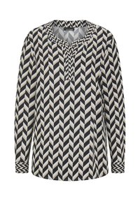 Top à manches longues avec un motif en chevrons noir et blanc, des accents beiges, un col rond et un subtil détail de boutons à l'avant.