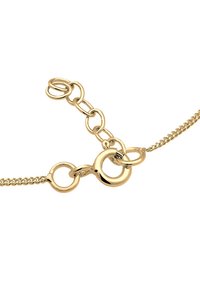 Guldhalsband med en blandning av länkar: släta runda ringar och texturerade kedjelänkar, med en säker låsning.