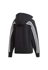 Sweat à capuche noir avec des triples bandes blanches courant des épaules jusqu'aux manches, vu de dos sur un fond uni.