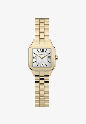 Montre rectangulaire dorée avec un cadran argenté, des index en chiffres romains et un bracelet en métal composé de maillons lisses et polis.