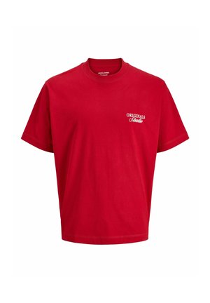 Rde majica iz bombaža s krojem, kratkimi rokavi in belim logotipom "ORIGINALS Studio" na levem prsnem delu.