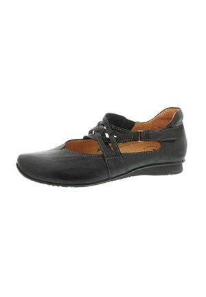 Chaussure plate en cuir noir avec lanières croisées, bout arrondi et petit talon, doublure intérieure marron clair et coutures détaillées.