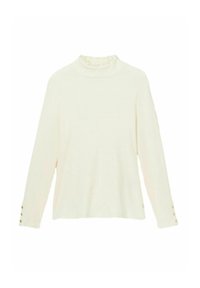 Kreemivärvi pikkade varrukatega topp, mis on valmistatud soonikriidest. Omab kõrget kaelust, millel on volangäär ja nööpidega mansetid.