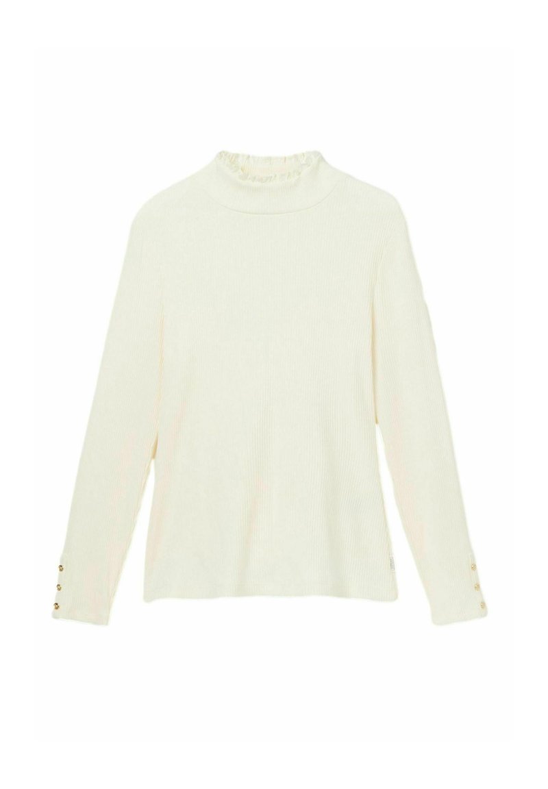 Kreemivärvi pikkade varrukatega topp, mis on valmistatud soonikriidest. Omab kõrget kaelust, millel on volangäär ja nööpidega mansetid.