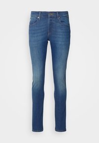 Blaue Denim-Jeans mit schlankem Schnitt. Mit einem verwaschenen Finish, einem Fünf-Taschen-Design und metallischen Beschlägen an der Taille und den Taschen.