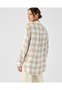 Damart À CARREAUX - Blusa - beige carreaux