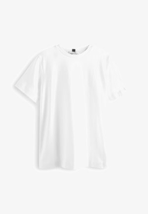 Witte katoenen t-shirt met korte mouwen, ronde hals en een iets losse pasvorm. Eenvoudig ontwerp, zonder patronen of extra accenten.