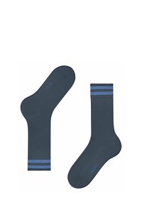 Calze a coste blu navy con strisce azzurre nella parte superiore. Realizzate in un morbido materiale tessile, presentano il nome del marchio "FALKE" in blu.