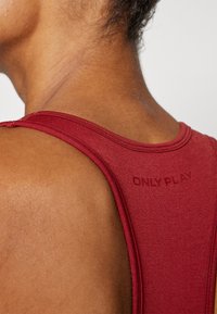 ONLY Play ONPDAISY-2 SEAM BRA  - Brassières de sport à maintien normal - sun dried tomato
