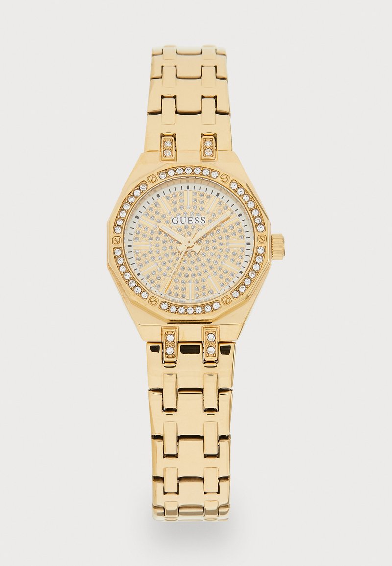 Gold stainless steel watch with octagonal case, textured silver dial, crystal accents, and a linked bracelet strap. Brand logo displayed.