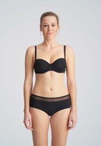 Czarny zestaw bielizny składający się z gładkiego, usztywnianego biustonosza na cienkich ramiączkach i dopasowanych majtek z przezroczystym pasem. Lekki, elegancki design.