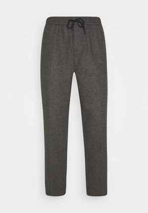Grijze sweatpants met een trekkoord in de taille, taps toelopende benen en een gestructureerde stof. Beschikt over zijzakken en een minimalistisch ontwerp.
