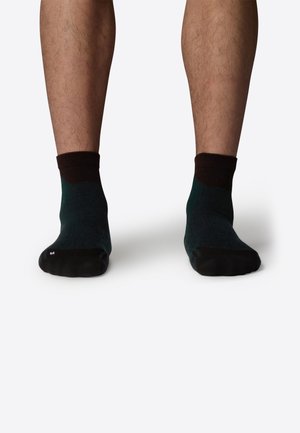 The North Face UNISEX ciemnozielony