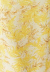 Cotton fabric with a yellow and light brown leaf pattern, featuring a soft texture and abstract design.