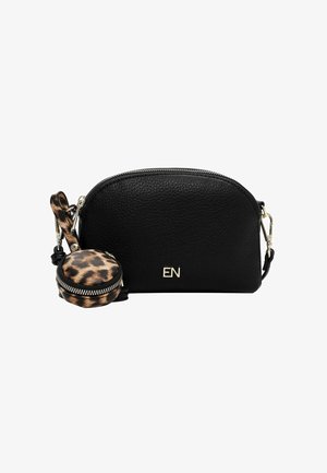 Black leather crossbody bag with zipper, gold hardware, and embossed logo; features a detachable round leopard print pouch.