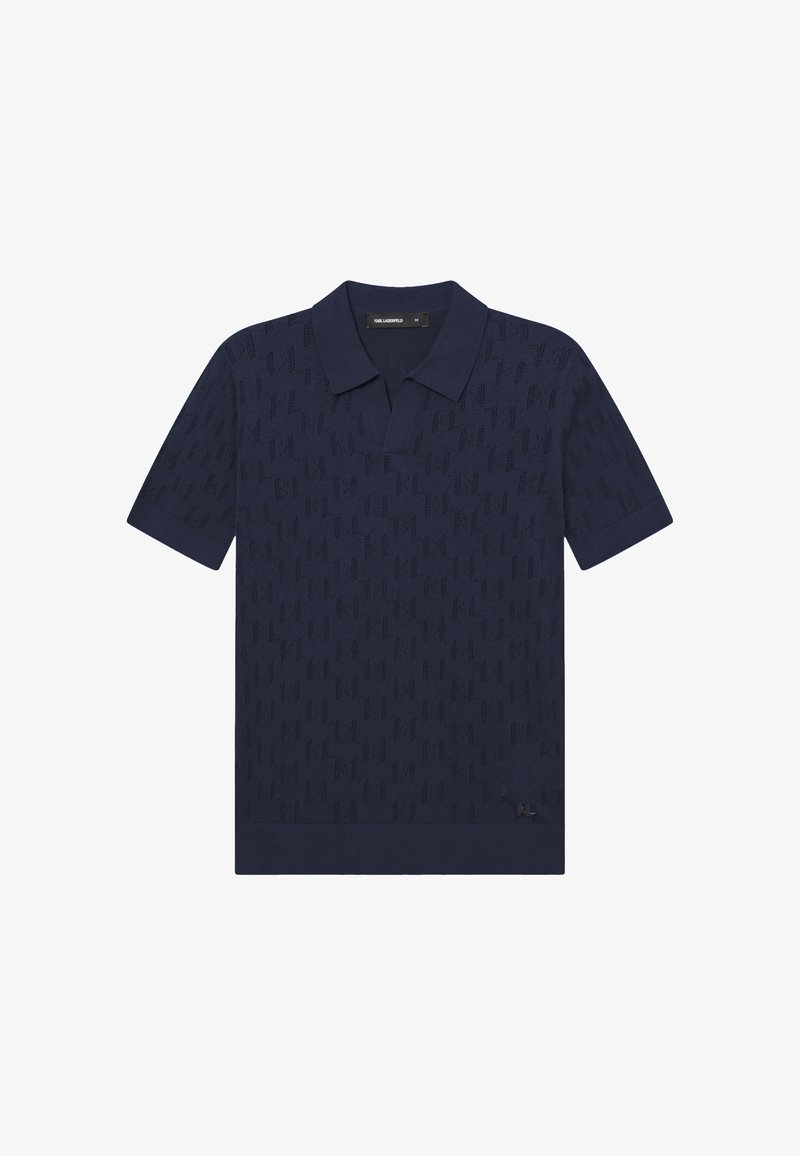 Polo a maniche corte color blu navy con motivo a rilievo sottile e piccolo logo del marchio vicino all'orlo.