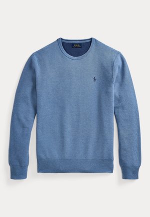Vaaleansininen, pitkähihainen pyöreäkauluksinen neule, jossa on resorit hihansuissa ja helmassa sekä pieni kirjailtu Polo Ralph Lauren -logo rinnassa.