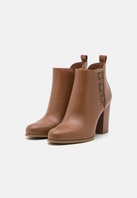 MICHAEL Michael Kors Stivaletti con tacco - brown