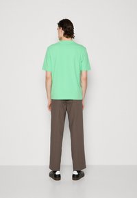BOSS TCHUP - T-Shirt basic - open green