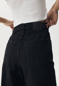 PULL&BEAR Flared jeans - mottled black