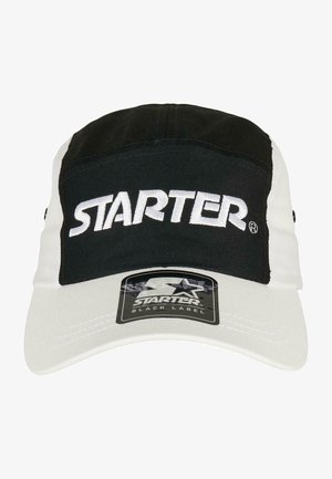Mustvalge käekott, millel on kaarjas ääre, ees olev valge "STARTER" logo tikandiga. Äärde on kinnitatud silt.