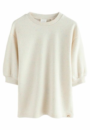 Cremefarvet sweatshirt med en spraglet tekstur, ribbet rund hals og puffede korte ærmer. Har en lille logotag ved kanten.