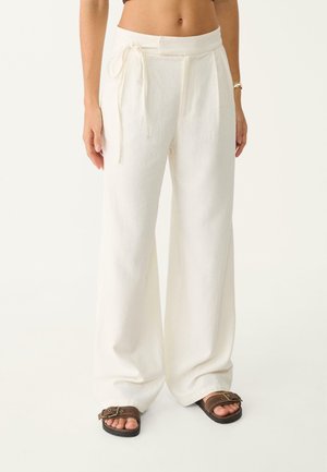 Stradivarius FLOWING - Trousers - beige