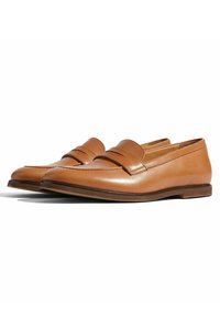 Brune læder loafers med et syet design, en hævet rem over vampen og en flad sål med en let kant. Glat tekstur hele vejen igennem.