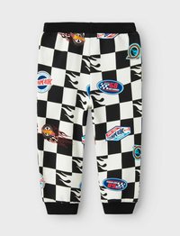 Zwart-wit geblokte sweatpants met grafische racelogo's en vlam patronen. Elastische tailleband en boorden, gemaakt van zachte stof.