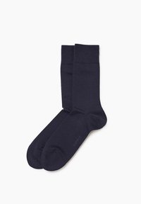 Marineblaue Baumwollsocken mit einer glatten Textur, ausgestattet mit einem gerippten Bündchen und einem dezenten Logo-Detail in der Nähe der Zehen. Klassisches Design bis zur Mitte der Waden.