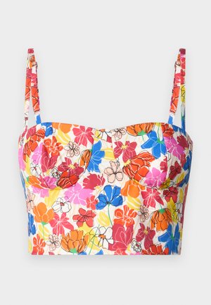 Kwiatowy top z krótkim rękawem z regulowanymi ramiączkami, z charakterystycznym wzorem w czerwone, różowe, pomarańczowe i niebieskie kwiaty na kremowym tle.