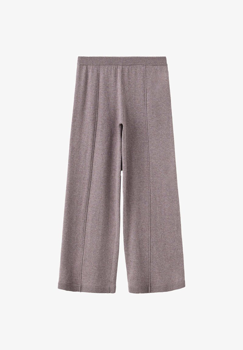 Pantalon en maille à jambes larges de couleur brun clair avec une taille haute élastique et des coutures verticales visibles sur chaque jambe.