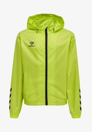 Heldere limoen groene lichtgewicht jas met een capuchon, zwarte rits en zwarte chevronaccenten op de mouwen. Gemaakt van waterafstotend materiaal.