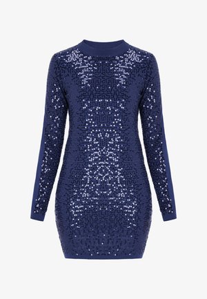 Tengerészkék, hosszú ujjú, testhezálló ruha, amely fényes flitterekkel van borítva, kerek nyakkivágással, bordázott mandzsettákkal és szegéllyel.