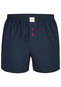 Tmavě modré bavlněné boxerky s elastickým pasem, se třemi červenými knoflíky nazipu a malou nášivkou na pase.
