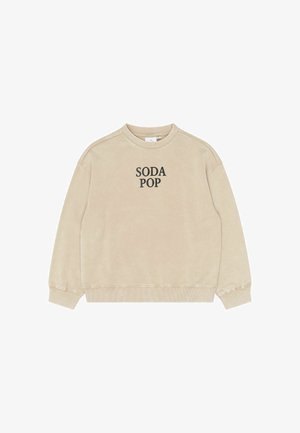 Sweat-shirt beige à col rond avec manches longues et texte noir « SODA POP » centré sur la poitrine.