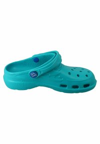 Aqua-colored plastic clog with ventilation holes, rounded toe, heel strap, and textured sole for grip. Smooth, flexible finish.