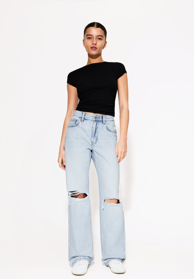 Bershka - WIDE- RIPPED - Zvonové džínsy - light blue, Zväčšiť