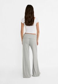 Stradivarius WIDE-WITH FOLD-DOWN WAIST - Nohavice - grey
